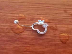 piercing de ombligo corazon con mariposa